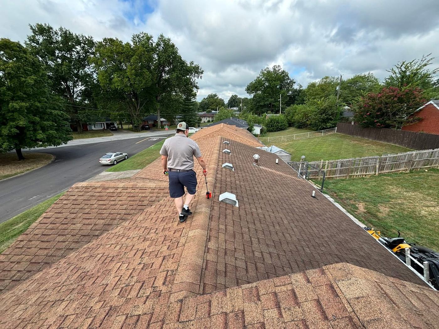Residential roof installation photographed during final detail work