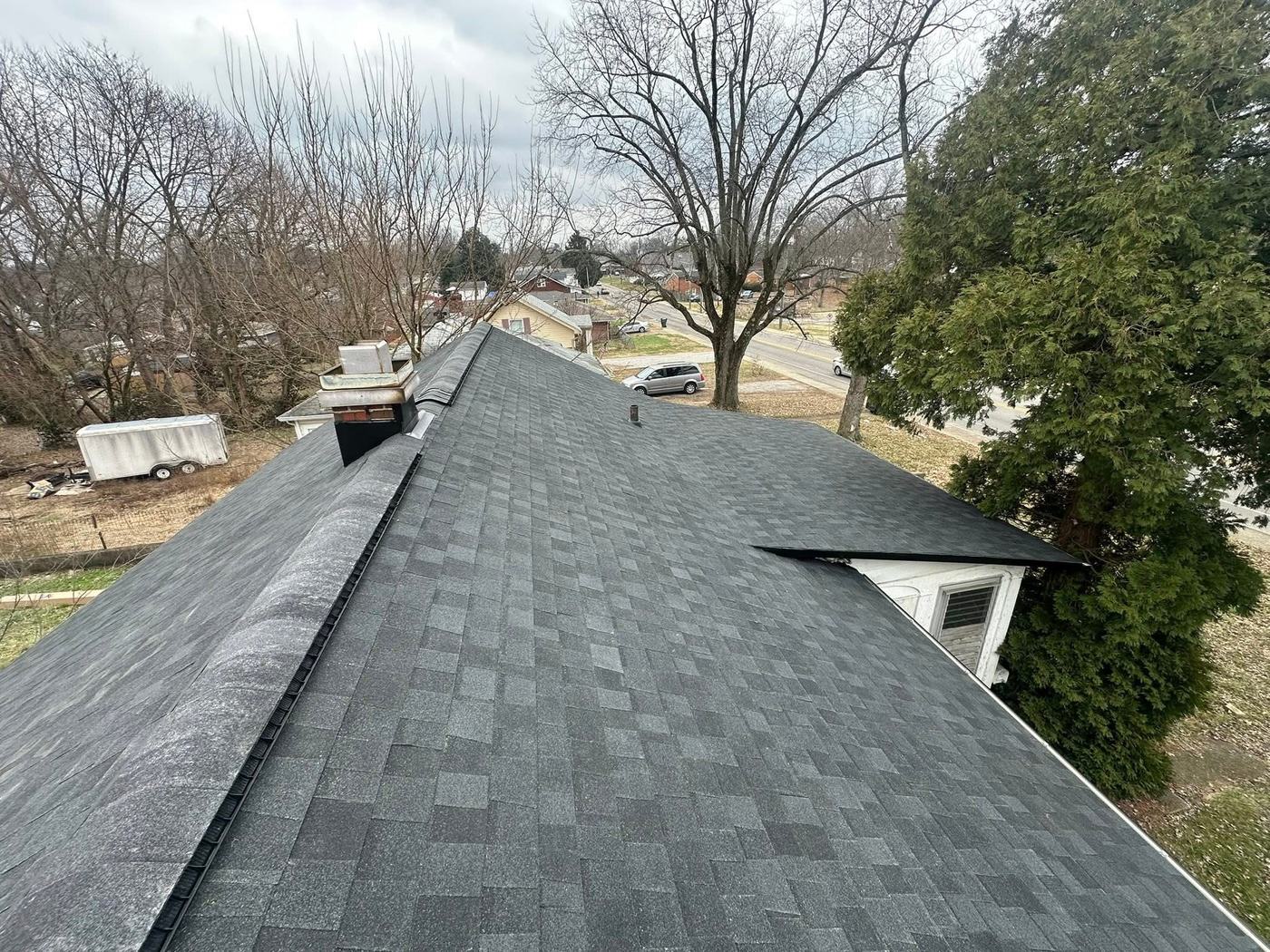 Residential roof replacement with valleys and roof vents