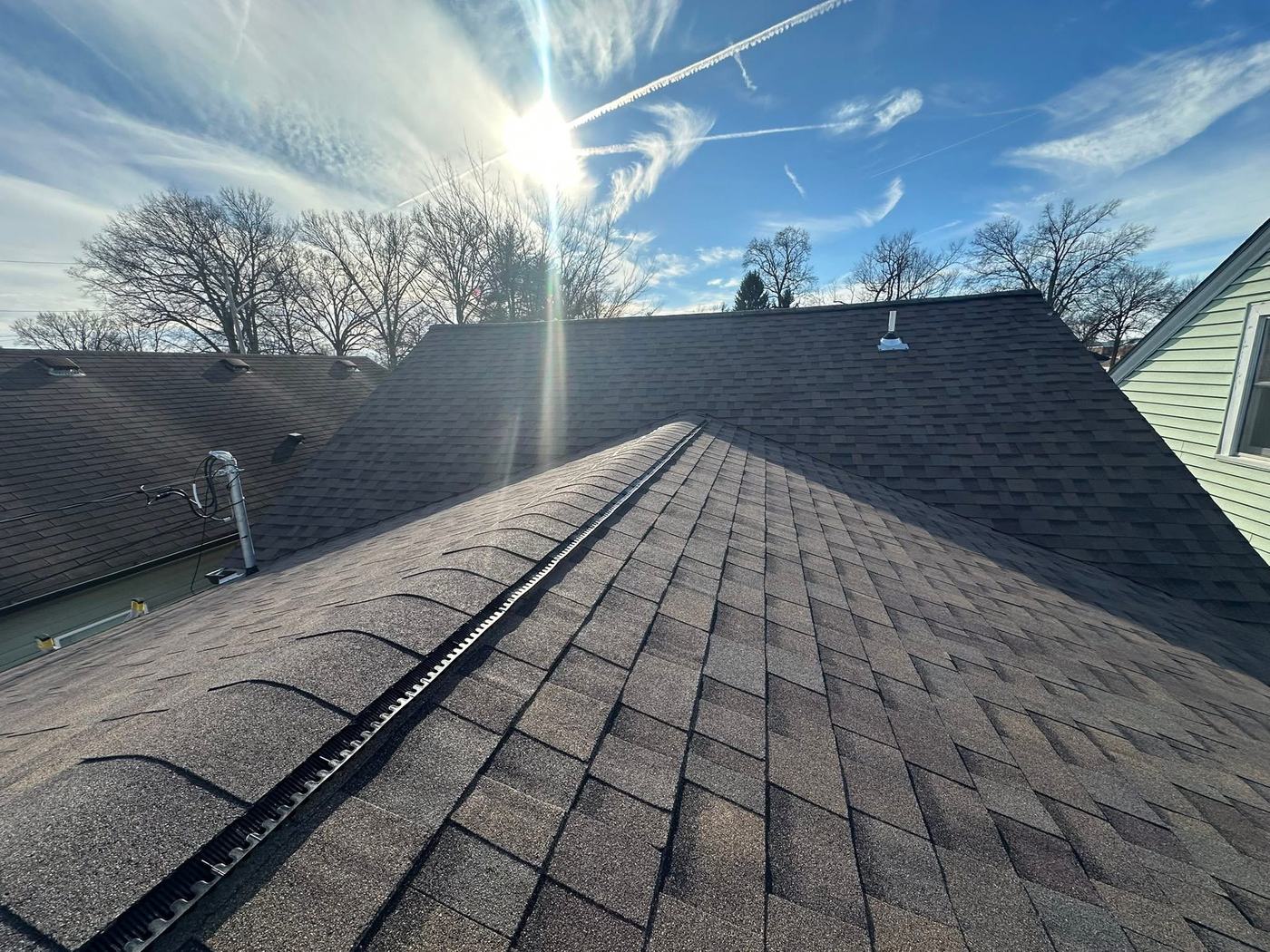 Residential roof replacement with clean shingle alignment