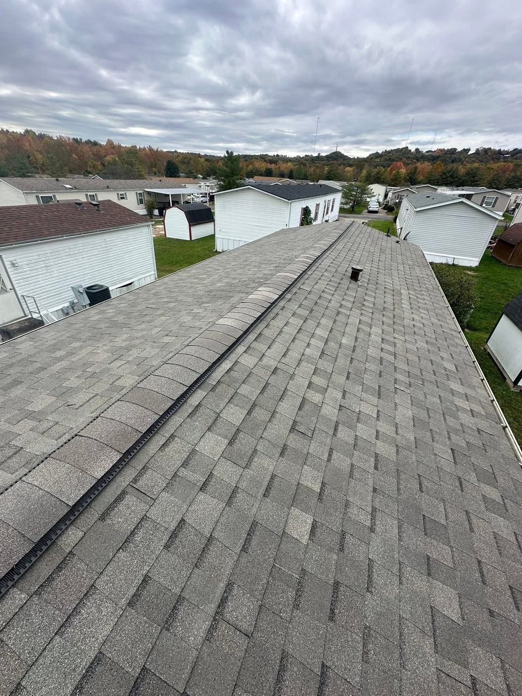 Finished roof project photographed from ridge line