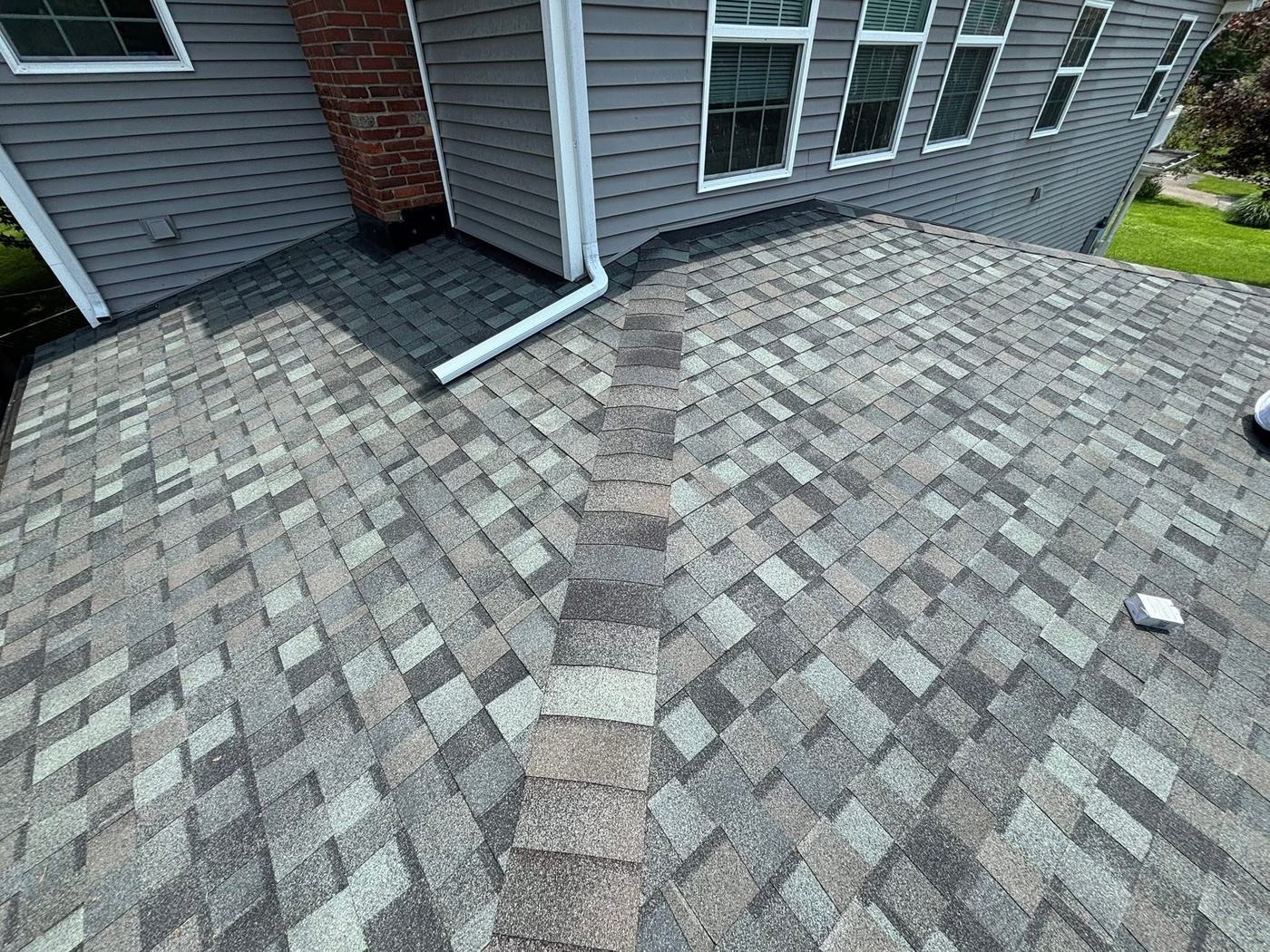 Residential roof replacement with dimensional shingles and vents